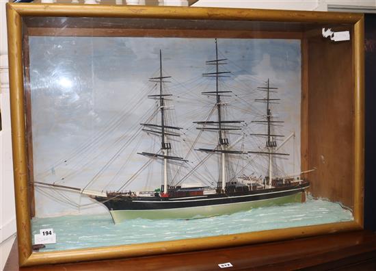 A Waterline model of the Cutty Sark, in display case overall 64 x 98cm